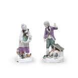A rare pair of Fulda figures of a man and woman feeding animals, circa 1770-75