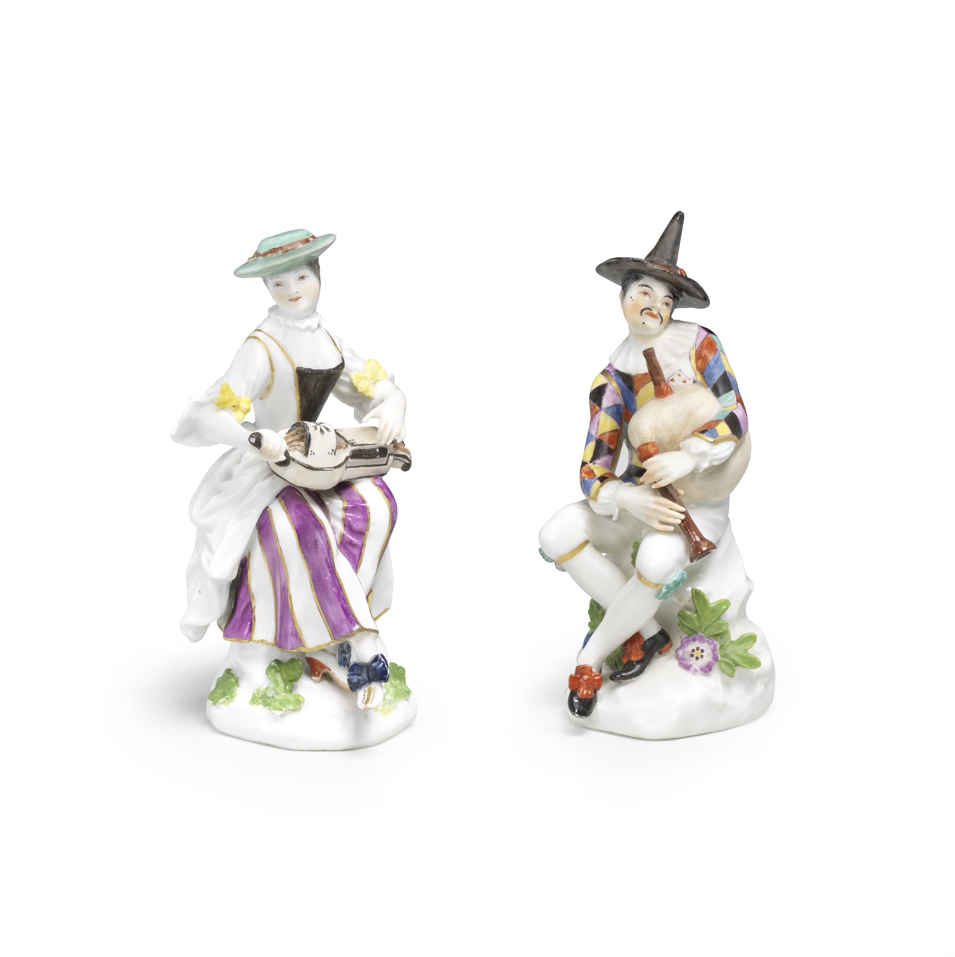 A pair of Meissen figures of Harlequin and Columbine playing instruments, circa 1745