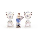 A pair of Doccia miniature vases on pedestals and a small Doccia figure of a girl, circa 1790-1800