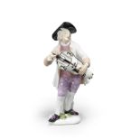 A Meissen figure of a hurdy-gurdy player from the large Cris de Paris series, circa 1745