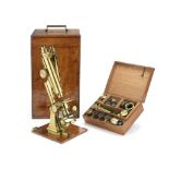 A Smith & Beck binocular compound microscope, English, late 19th century, (2)