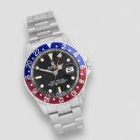 Rolex. A stainless steel automatic calendar bracelet watch with dual time zone GMT Master 'Pepsi...