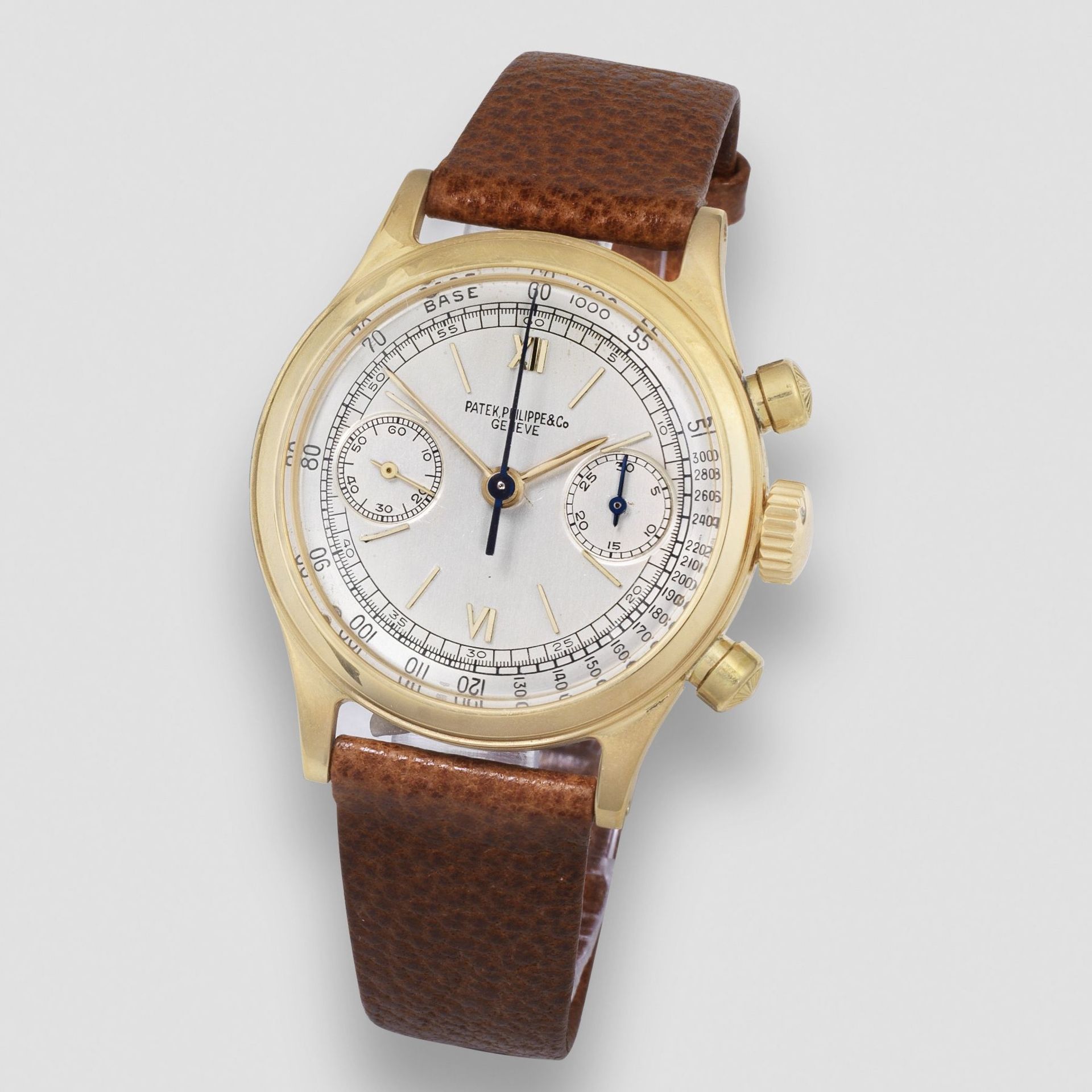 Patek Philippe. A fine and rare 18K gold manual wind chronograph wristwatch with water resistant ...