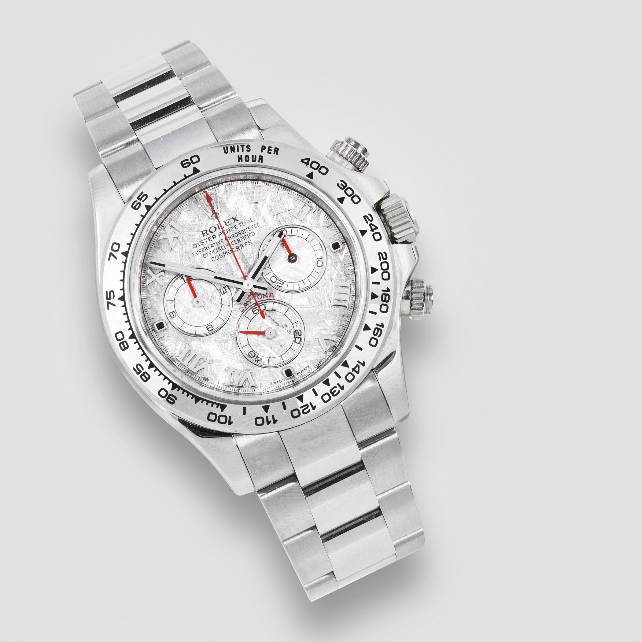 Rolex. An unusual 18K white gold automatic chronograph bracelet watch with meteorite dial Cosmog...