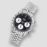 Rolex. A stainless steel manual wind chronograph bracelet watch with red Daytona Cosmograph Dayt...