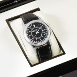 Patek Philippe. An 18K white gold automatic calendar wristwatch Calatrava, Ref: 6000G, Purchased...