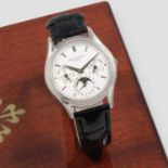 Patek Philippe. A fine 18K white gold automatic perpetual calendar wristwatch with moon phase Ref...