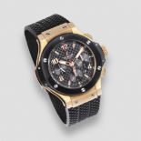 Hublot. An 18K rose gold, black ceramic and titanium automatic calendar chronograph wristwatch B...