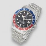 Rolex. A stainless steel automatic calendar bracelet watch with dual time zone GMT Master 'Pepsi...