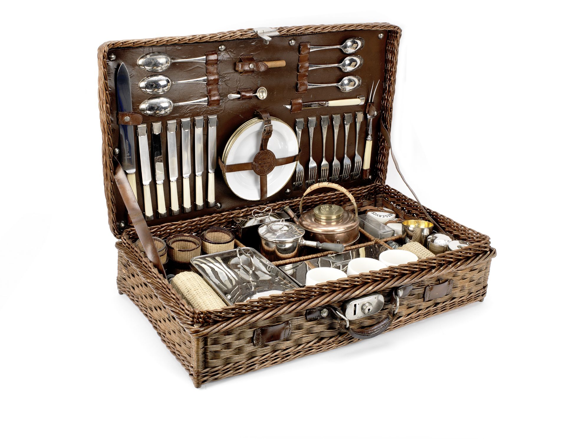 A wicker-cased picnic set for six persons by Finnigans, circa 1909,