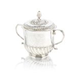 A William and Mary silver two-handled cup and cover maker's mark 'IA' conjoined, probably John Au...
