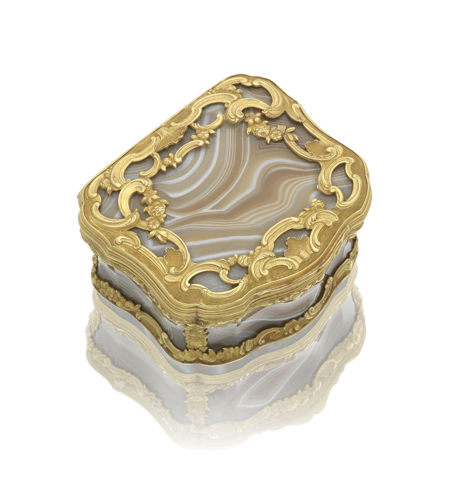 An 18th century striated agate and gold-mounted box with later French eagle's head gold mark