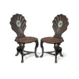 A pair of George II mahogany hall chairs (2)