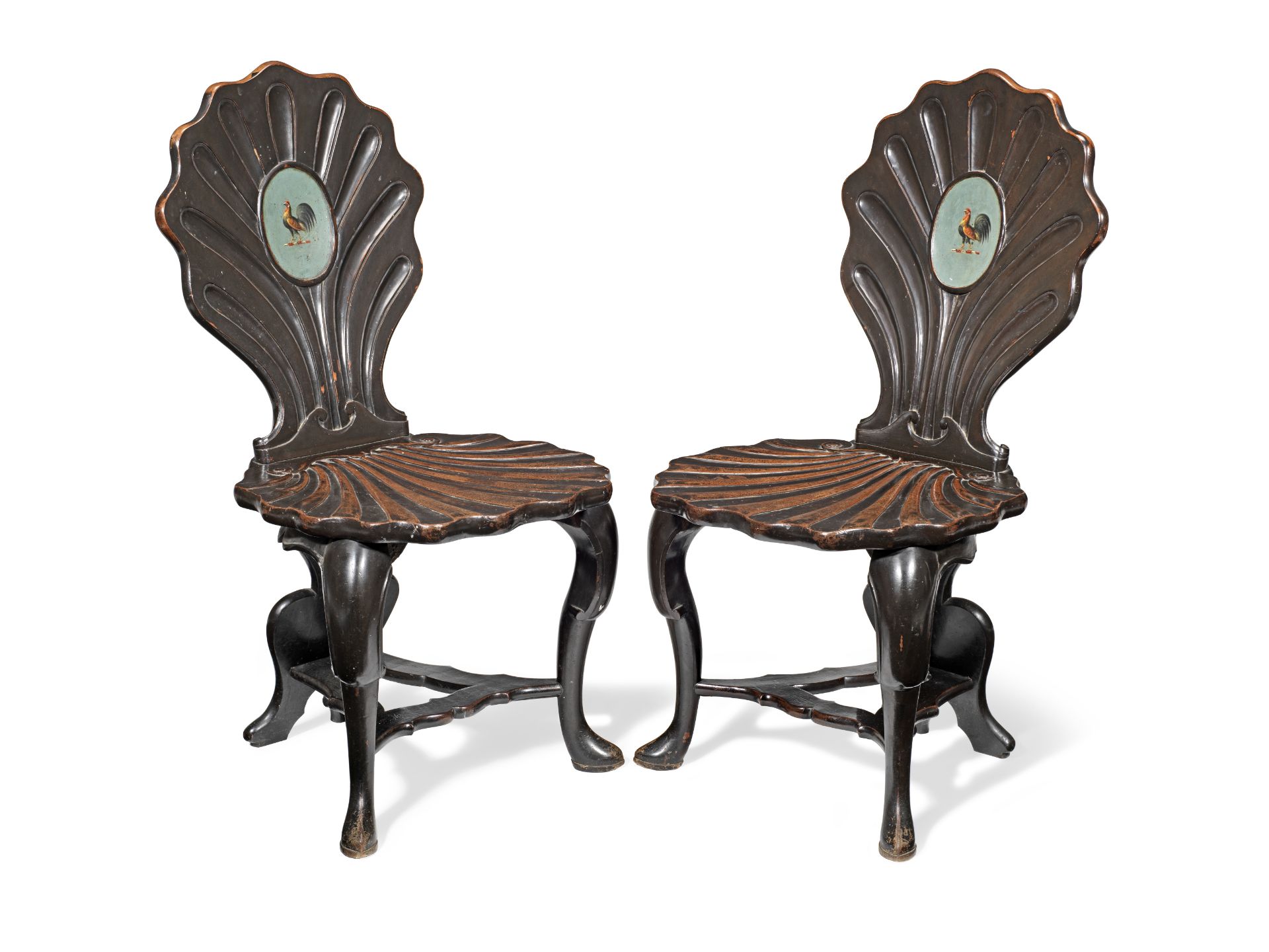 A pair of George II mahogany hall chairs (2)