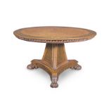 A Regency burr elm, pollard oak and brass inlaid breakfast table attributed to the workshop or ci...