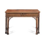 A George III mahogany writing table after a design by Thomas Chippendale