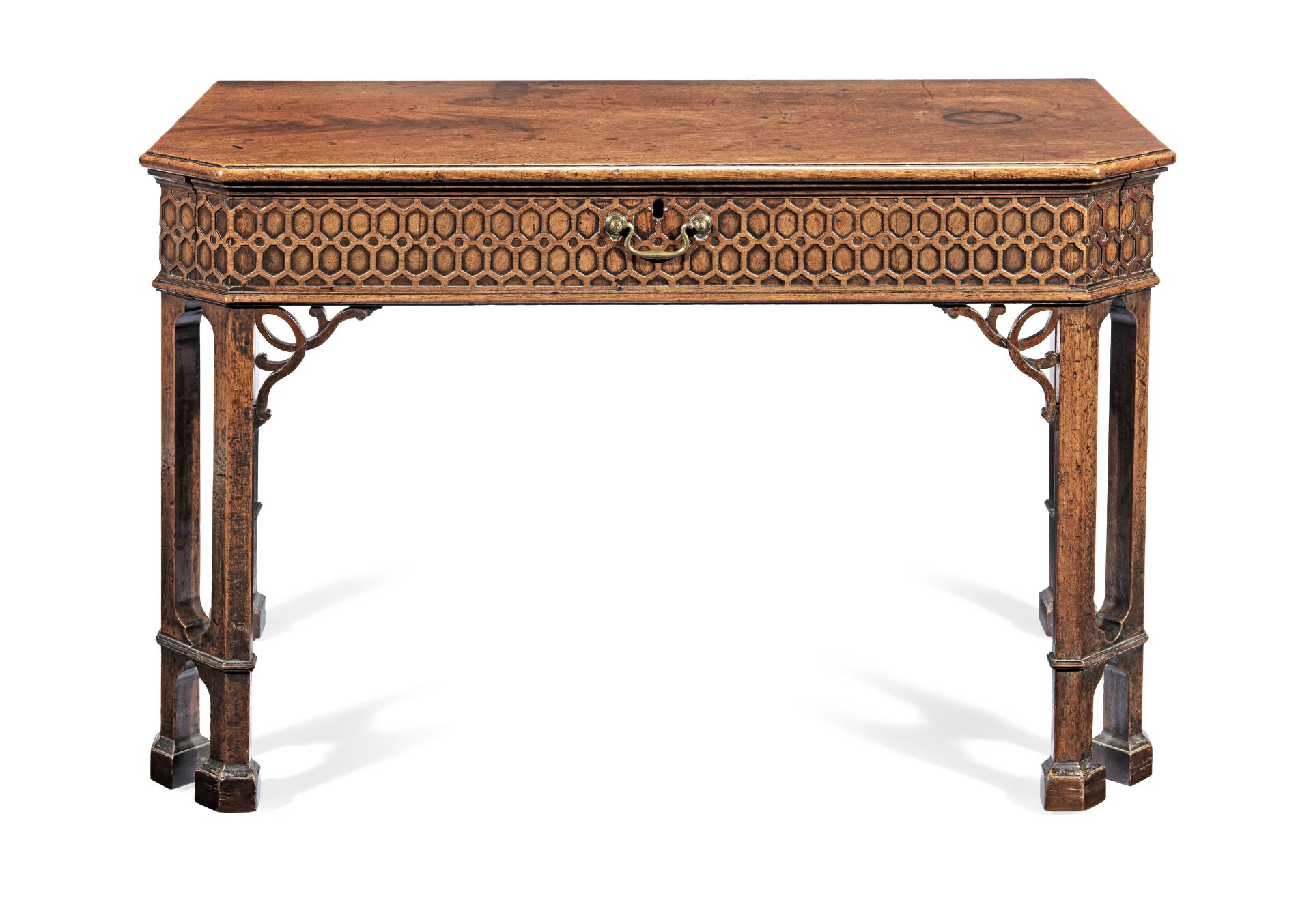 A George III mahogany writing table after a design by Thomas Chippendale