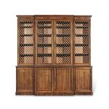 A Regency rosewood and brass mounted breakfront bookcase