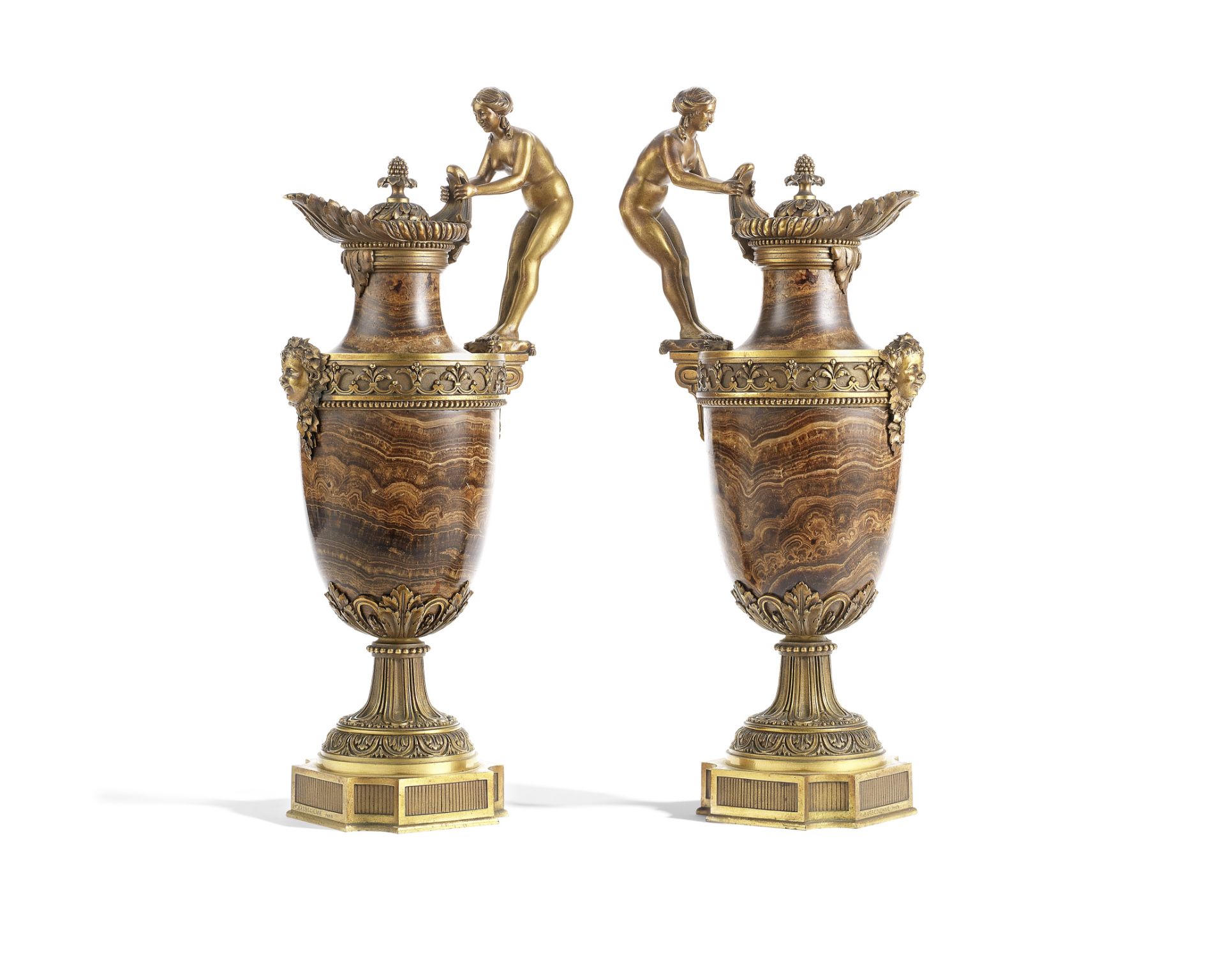 A pair of late 19th century Ferdinand Barbedienne gilt bronze mounted banded agate figural garnit...