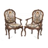 A pair of Italian 18th century walnut open armchairs (2)