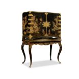 A George III ormolu mounted japanned cabinet on a later stand the cabinet probably circa 1760, th...