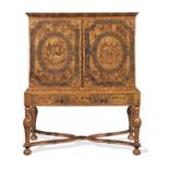 A Charles II oyster veneered olivewood, rosewood, ebony, stained bone and marquetry cabinet on a ...