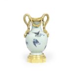 A Louis XVI gilt bronze mounted Chinese celadon garniture vase the porcelain Qianlong period (173...