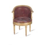 A French mid-19th century giltwood fauteuil de bureau/cabinet in the Louis XVI style