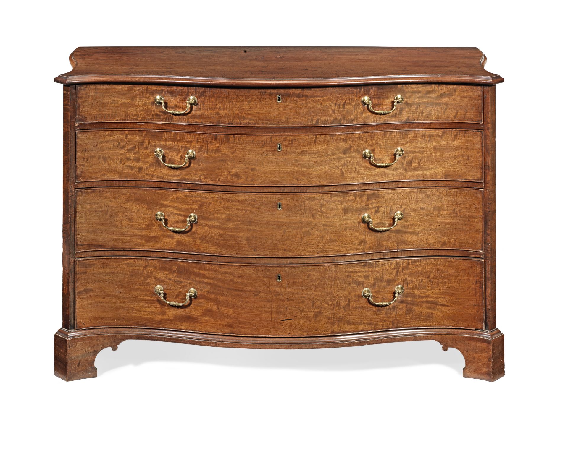 A George III mahogany serpentine commode attributed to Thomas Chippendale (1718-1779)