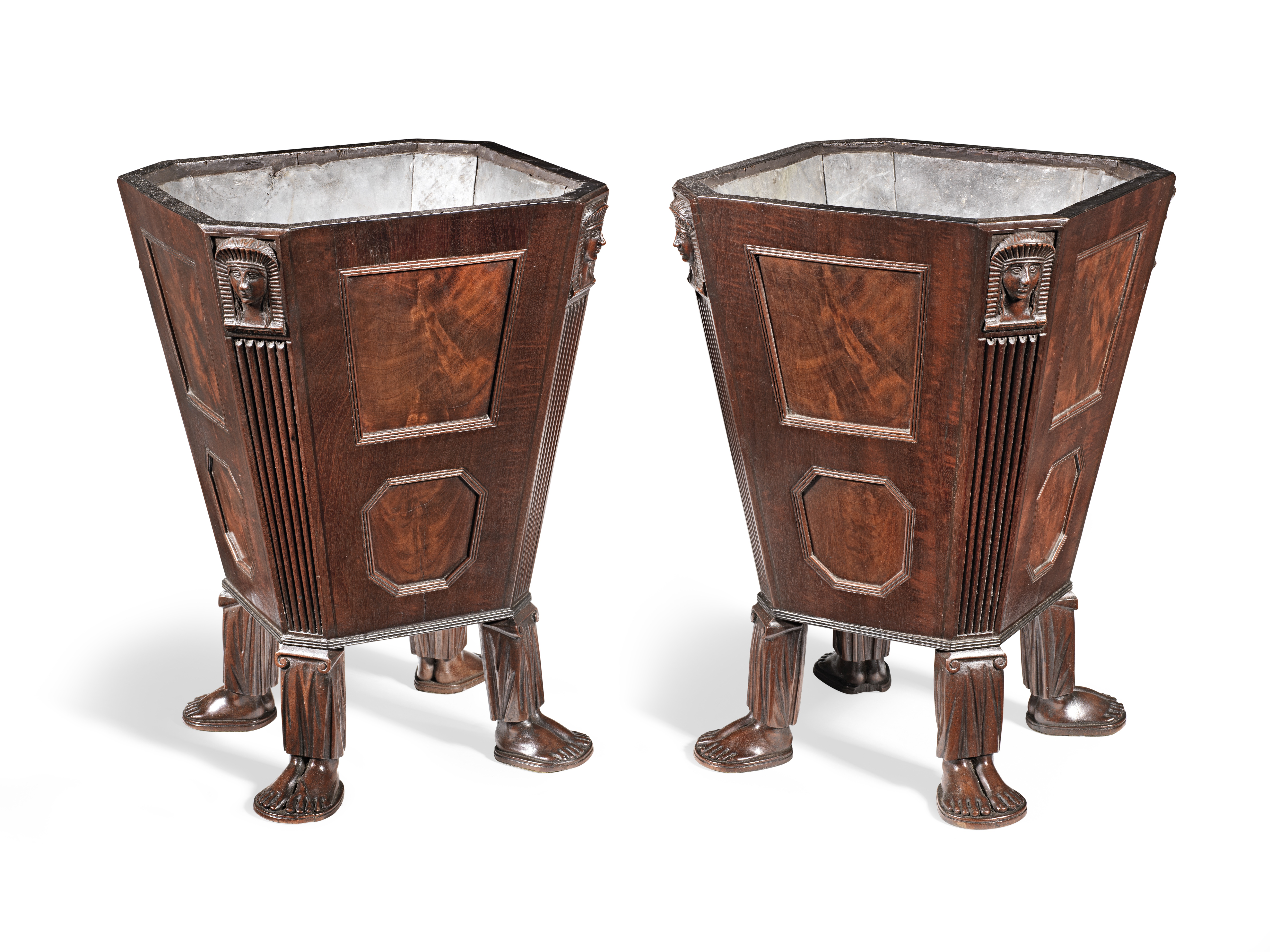 A pair of Regency 'Egyptian revival' mahogany and ebonised line-inlaid wine coolers (2)