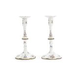 A pair of South Staffordshire enamel candlesticks, circa 1770