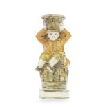 A rare Prattware 'Boy On A Barrel' Toby Jug, circa 1800