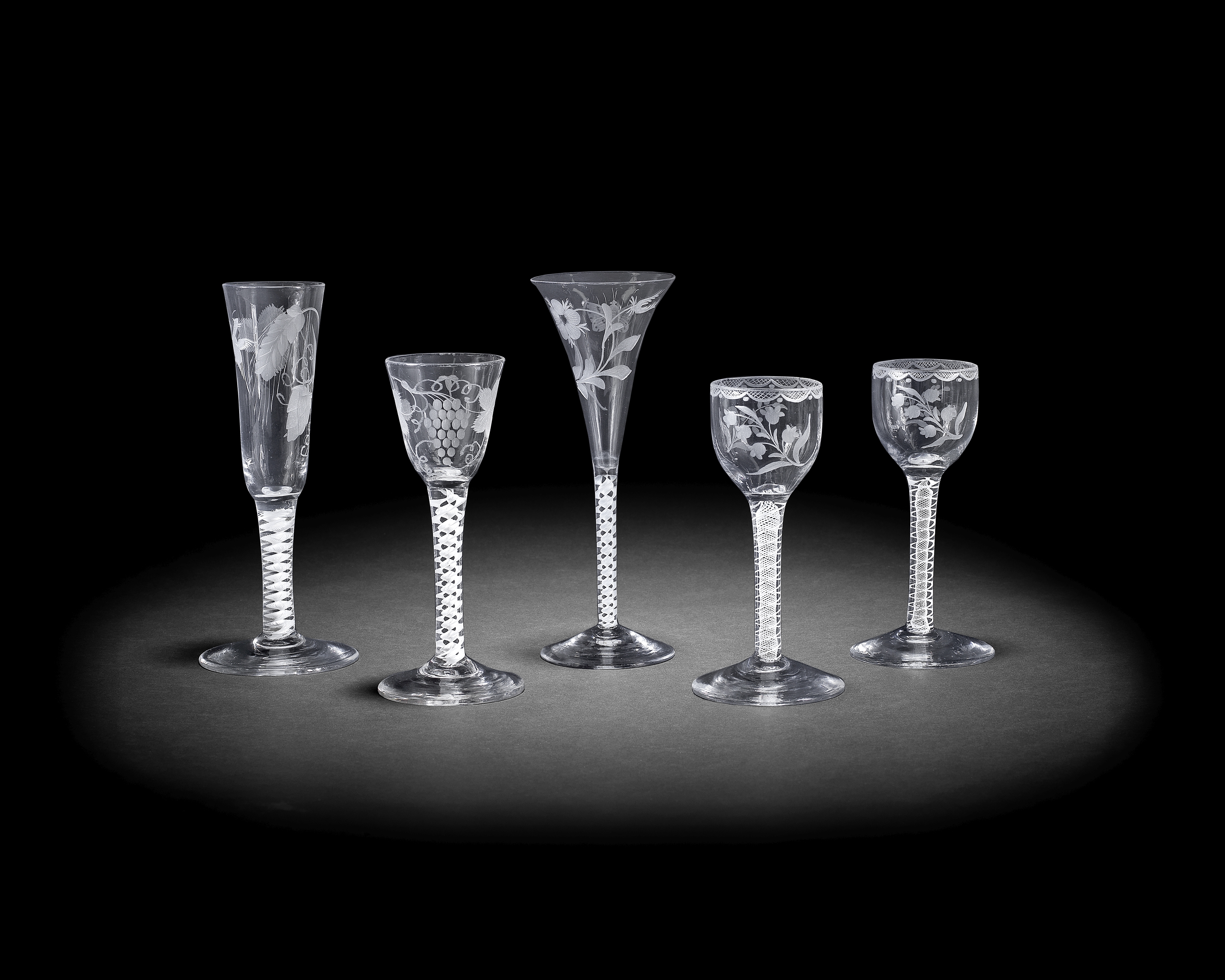 Five engraved opaque twist glasses, circa 1765