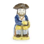 A bearded Prattware Toby Jug and cover, circa 1800