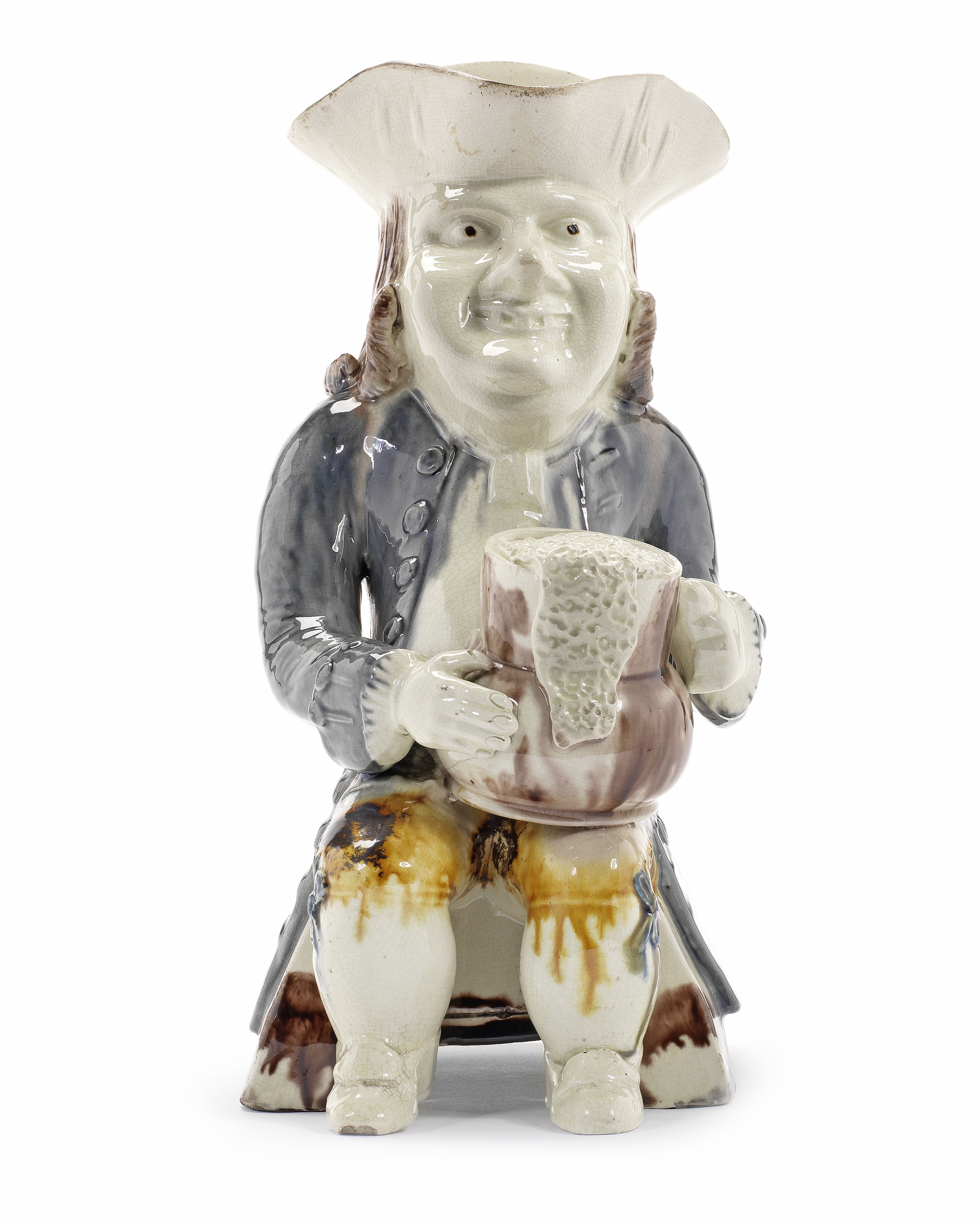 A very rare creamware 'Tipsy Man' Toby Jug, circa 1785