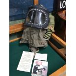 A WW2 1939 baby anti-gas helmet. Comes with various paper work