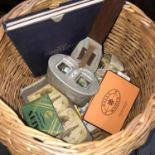 A Basket of collectables which includes antique scope with slides, Wills cigarette cards tin and