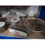 A shelf of collectables to include dressing table set, Satsuma hand painted plate and trinket boxes