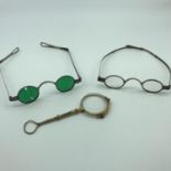 A Set of gilt metal Pince Nez together with two pairs of antique silver framed spectacles. One set