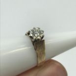 A Ladies London 9ct gold ring set with a large round cut diamond, Has 0.44ct diamond setting, 10/