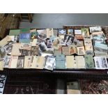 A Large collection of vintage unused postcards album souvenir books and loose postcards. Also