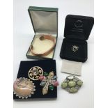 A collection of mixed Scottish and Celtic jewellery which includes Silver Ola Gorie Luckenbooth