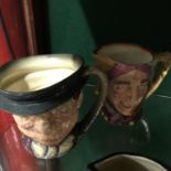 Two large Royal Doulton character toby jugs, "Tony Weller & Touchstone Jester"