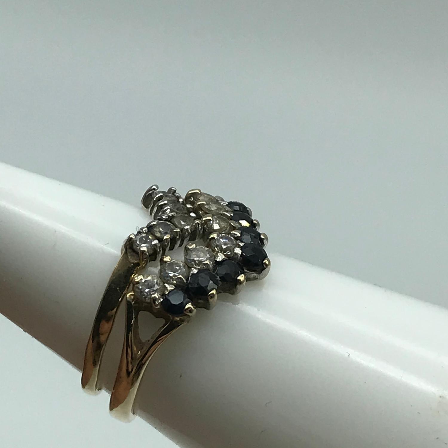 Two 9ct gold ladies wish bone rings set with clear stones and black stones. Ring size L (BLACK AND - Image 2 of 2