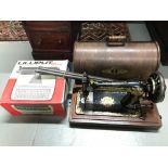 Antique singer sewing machine with carry case (Egyptian art work) together with Lilliput Junior