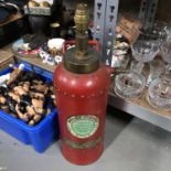 Antique Firemaster Extinguisher made into a table lamp.