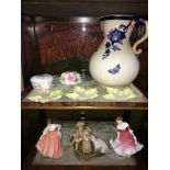 Two shelves of collectables which includes two Royal Doulton figurines "Fair Lady & My best