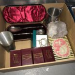 A Box of collectable odds which includes precious stone, Silver plated serving spoons, Tankard and