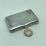 An 875 Silver cigarette case. Designed with raised initials E.H.