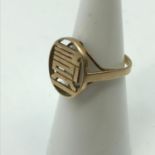 An Oriental 15K gold ring, Ring size I, Weighs 1.78Grams